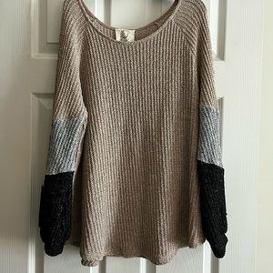 Boutique woman’s long sleeve sweater